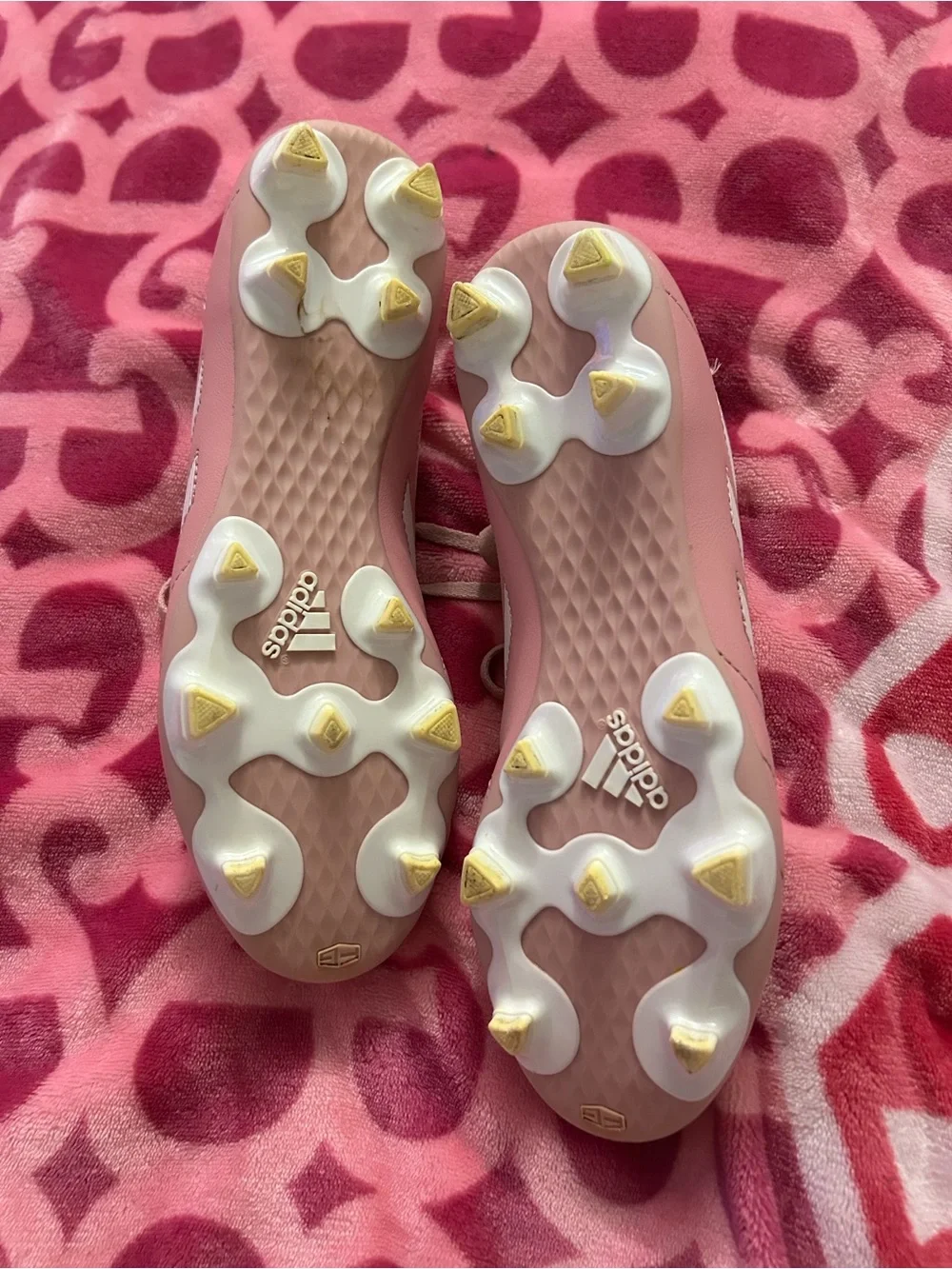 adidas Pink Women’s Soccer Cleats with White Stripes